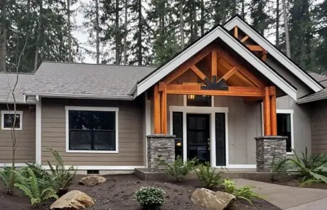 Aspen – Tacoma – Exterior Front - Inspire Homes Modern suburban house exterior with landscaped entryway - Tacoma Home Builder - Aspen Home Plan