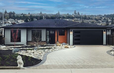 Custom Beach Front Modern single-story house with landscaped front yard