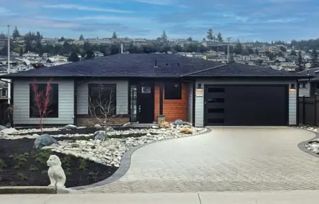 Custom Beach Front - Inspire Homes Modern single-story house with landscaped front yard