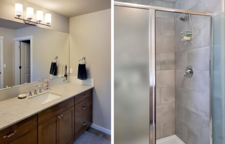 - Inspire Homes Modern bathroom with large vanity and shower - Tacoma Home Builder - Aspen Home Plan