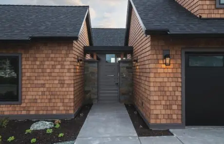 Gallery_0000s_0006_2213_skyline_way-4 - Inspire Homes Modern wooden house entrance with exterior lighting