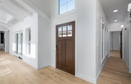 Gallery_0000s_0008_2217_skyline_way-42 - Inspire Homes Modern entryway with wooden door and hallway