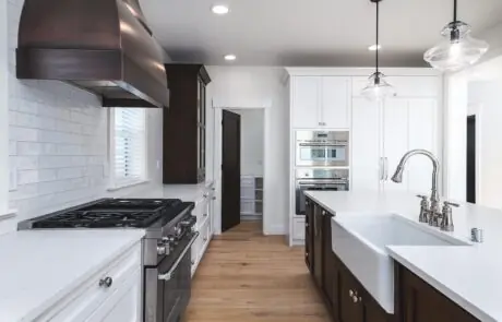 Gallery_0000s_0011_2217_skyline_way-31 - Inspire Homes Modern kitchen with white cabinets and appliances