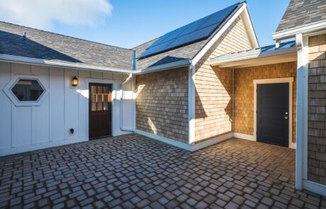 Gallery_0000s_0016_Fidalgo Villas 2 Courtyard Modern house exterior with solar panel installation