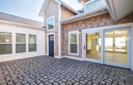 Gallery_0000s_0017_Fidalgo Villas 2_Courtyard 2 Modern coastal home with large patio area