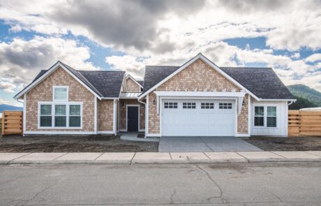 Gallery_0000s_0019_2217_skyline_way-3 Modern single-story home with attached garage driveway
