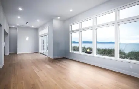 Gallery_0000s_0033_Inspire Homes – Anacortes – Fidalgo Villas – Custom Home – Living Room - Inspire Homes Spacious modern living room with ocean view