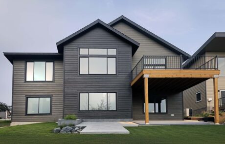 Inspire Homes Juniper Welch Back Modern two-story house with large windows exterior.