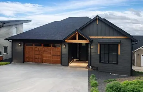 Inspire Homes Juniper Welch Exterior - Inspire Homes Modern single-story house with wooden garage door