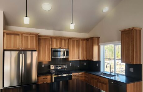 Inspire Homes Langley Traditional Kitchen Modern kitchen with wooden cabinets and appliances
