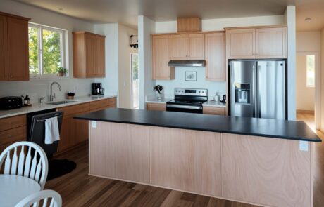 Inspire White Oak Kitchen Modern kitchen with wooden cabinets and island