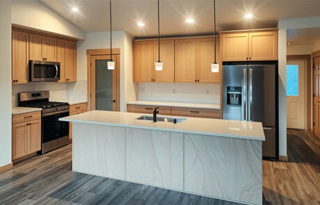 Kitchen Gerrisen Modern kitchen with wooden cabinets and island