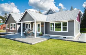 Modern single-story house with a spacious lawn