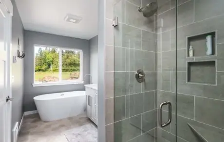 Madrona Custom Home Master Bath - Inspire Homes Modern bathroom with bathtub and glass shower