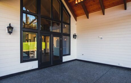 Redwood Custom Covered Back Porch Modern house patio with large glass doors