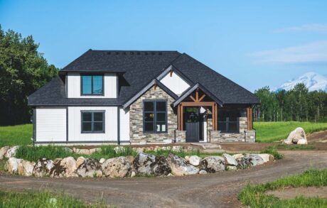 Redwood Custom Front Modern countryside home with stone and wood accents