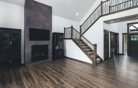 Redwood Custom Living Room - Inspire Homes Modern living room with wooden staircase design