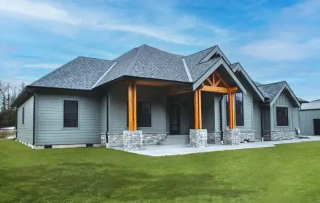 Redwood Timberframe Front Left - Inspire Homes Modern gray house with wooden accents exterior